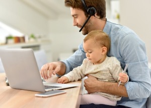 Man working from home with baby